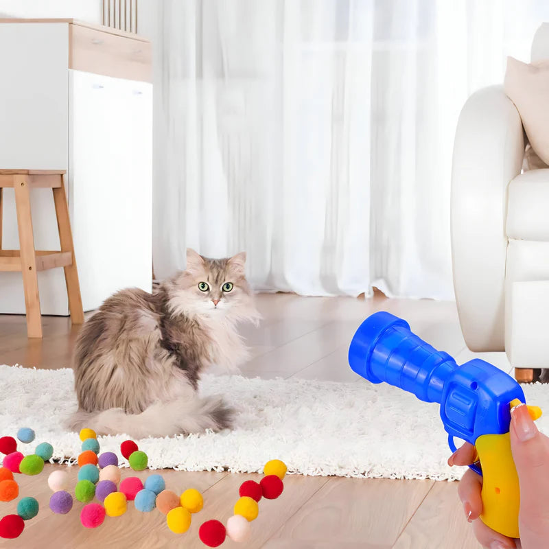 Igračka za mačke i male pse + podloga za hranjenje kućnih ljubimca + pištolj + loptice